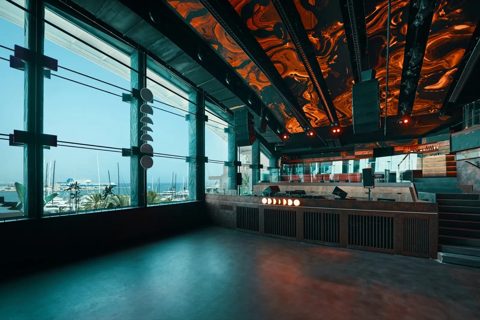 Large hall at Fitz Mallorca in Palma with windows overlooking the harbour