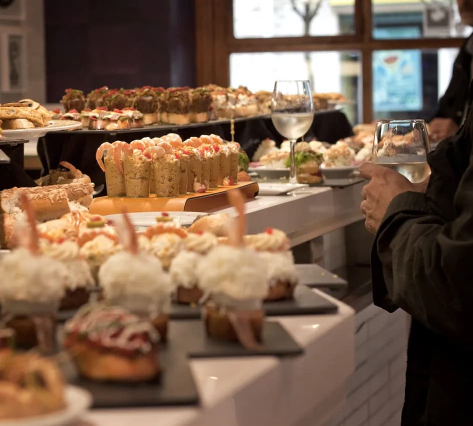 Pinchos buffet laid out in the dining room of Bar Bergara in Donostia-San Sebastián