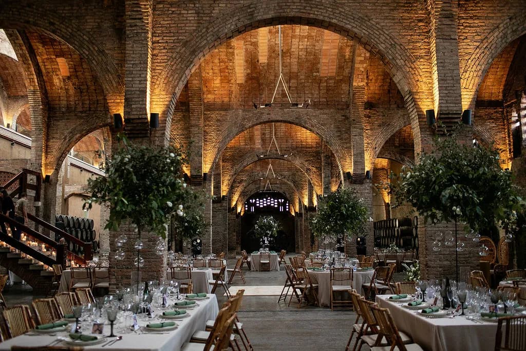 Brick vaulted hall at Cavas Codorníu set for dinner