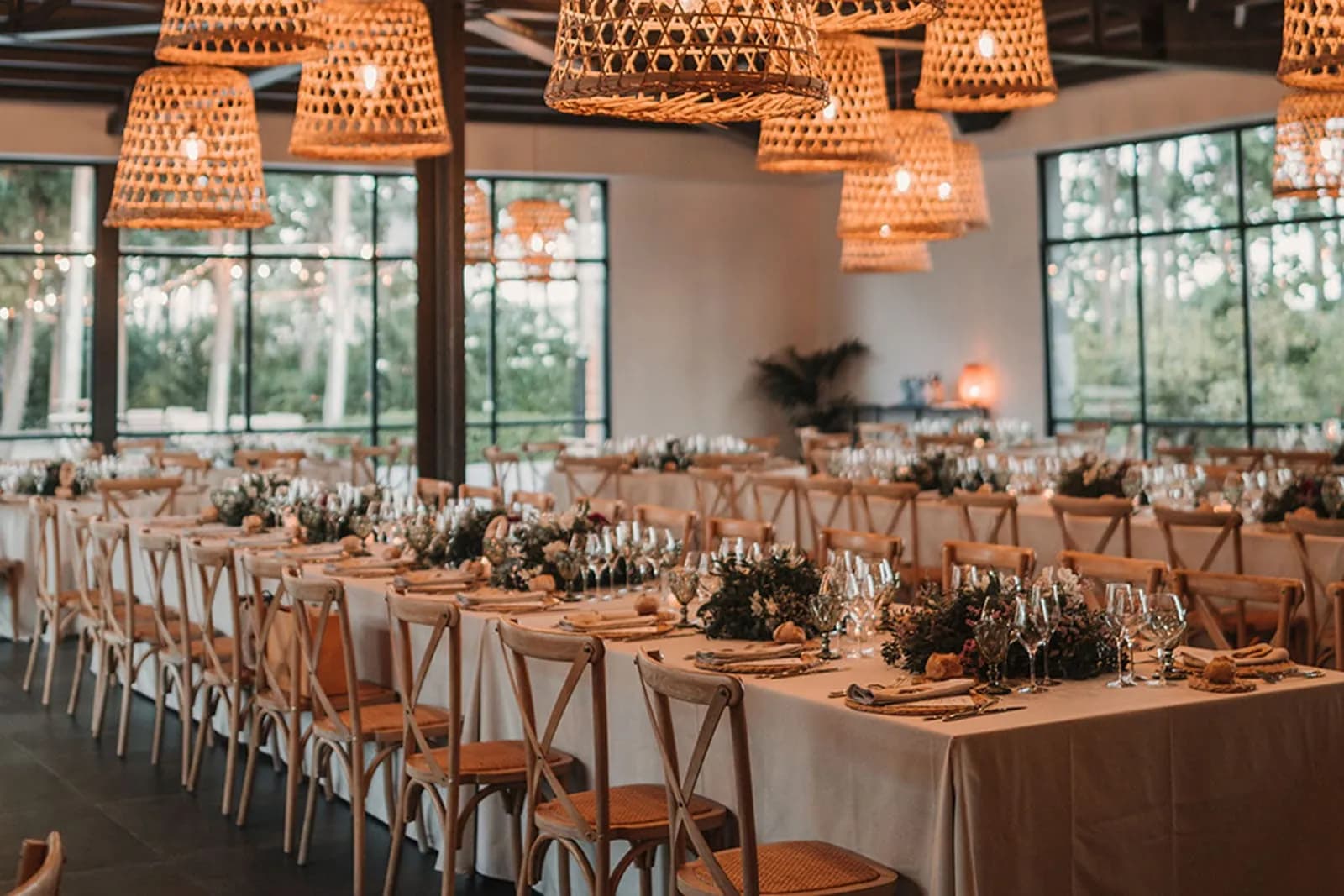 Indoor hall with banquet tables set