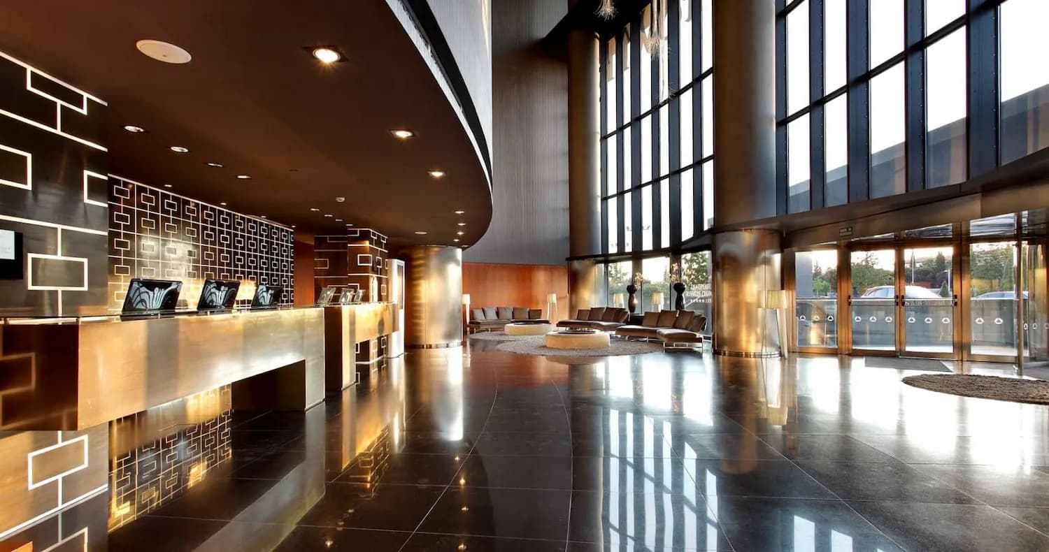 Reception hall of Eurostars Madrid Tower with floor-to-ceiling windows in Madrid