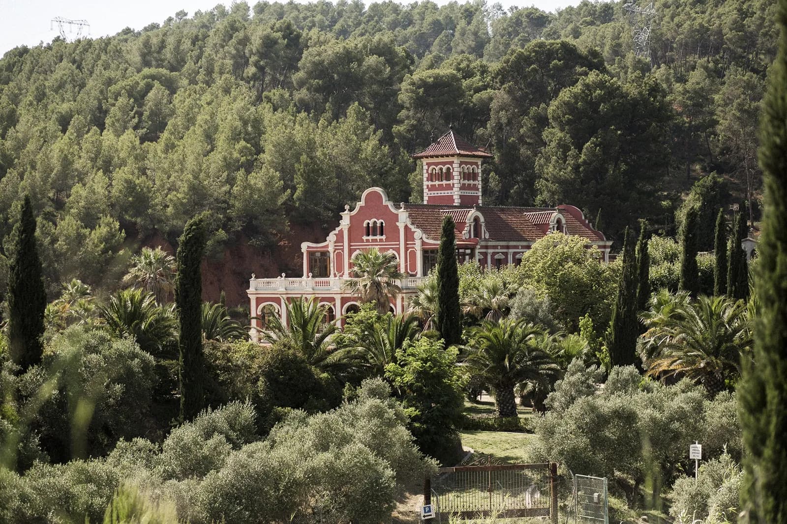 Overview of the Indian-style house set in its garden