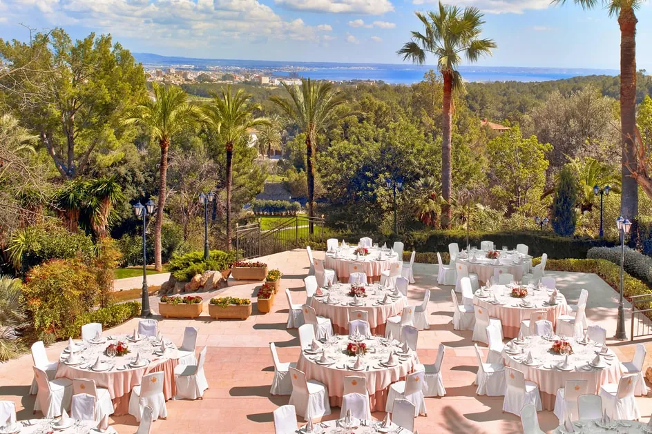 Outdoor reception set on the terrace of Castillo Hotel Son Vida in Palma
