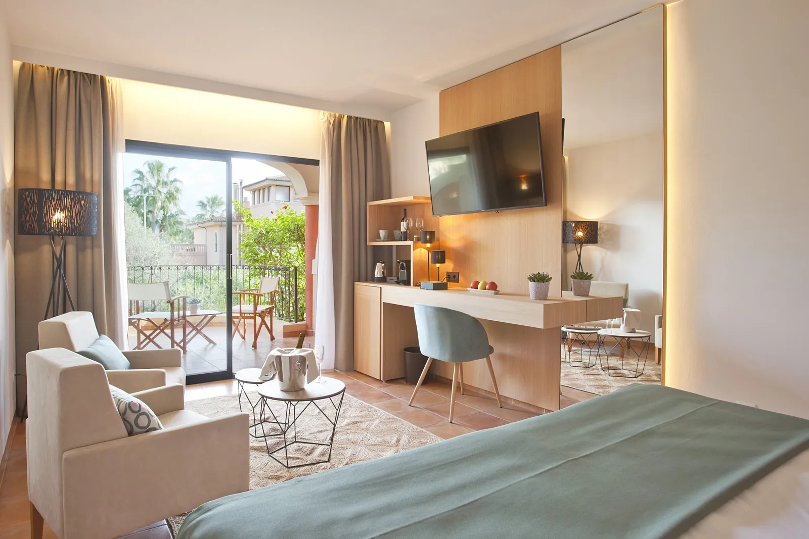 Guest room at Mon Port Hotel & Spa with terrace and lounge corner in Port d'Andratx
