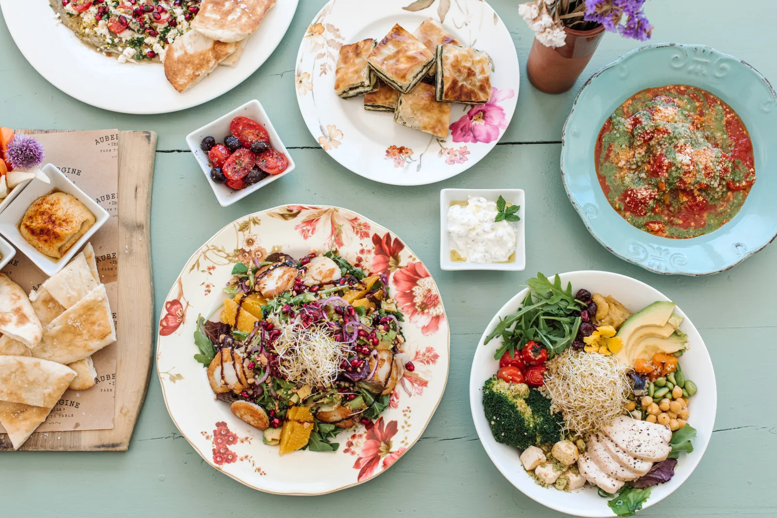 Assorted shared dishes served at Aubergine by Atzaró in Ibiza