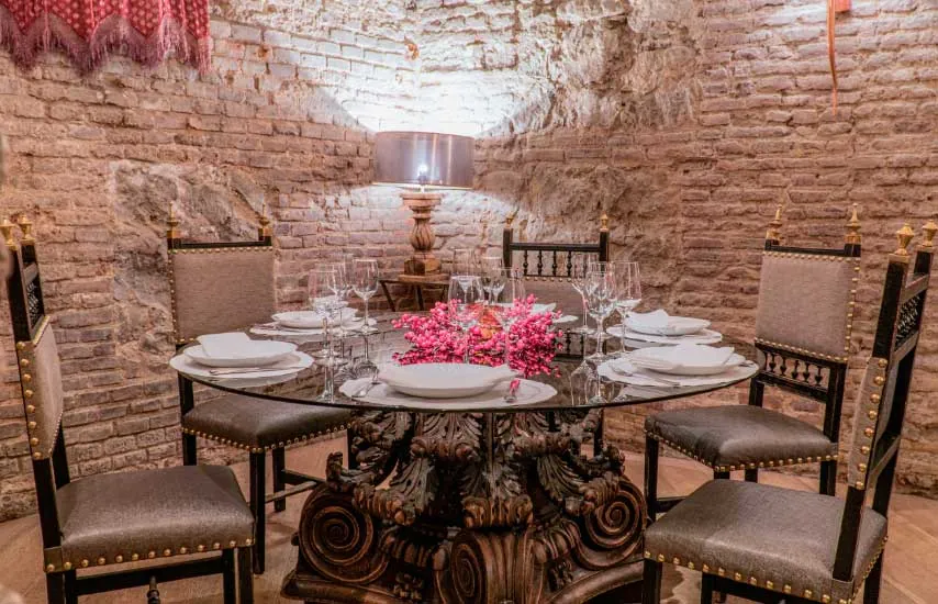 Round table set in the dining room of Café de Oriente in Madrid