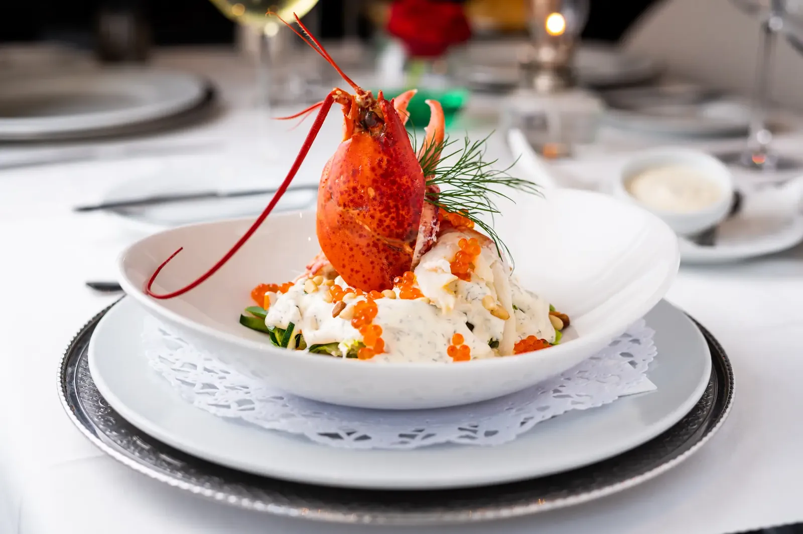 Lobster served on a white plate at Los Bandidos in Puerto Banús