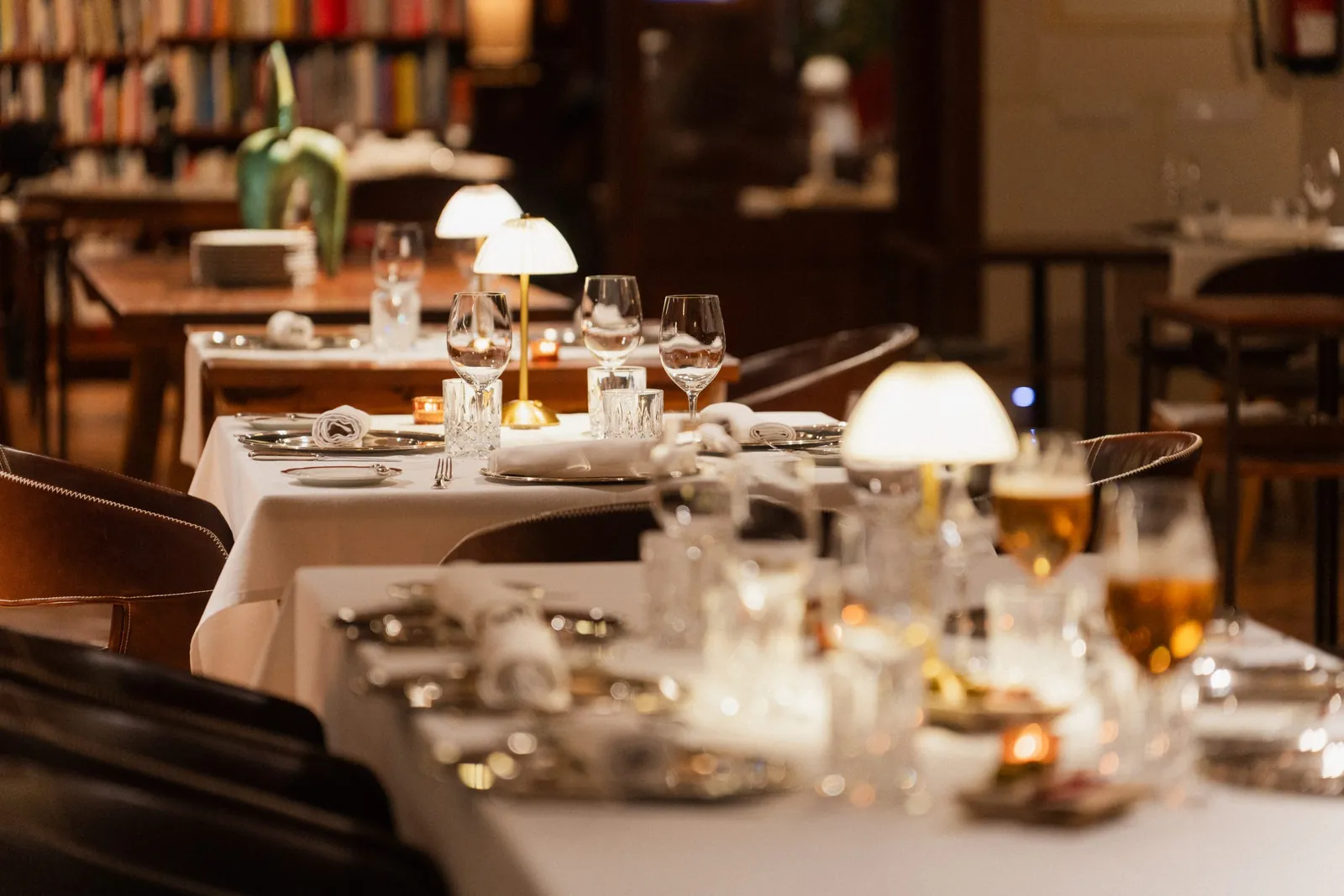 Tables set with glasses and candles at Sa Pedrera d'es Pujol in Sant Lluís