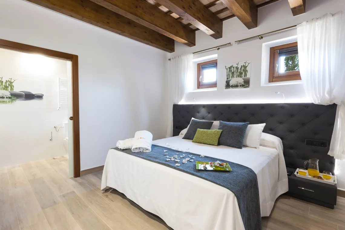 Double bedroom under timber beams
